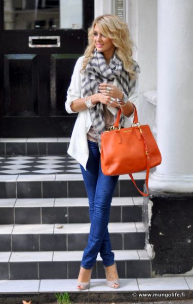 white casual blazer with gray checkered scarf and orange leather case