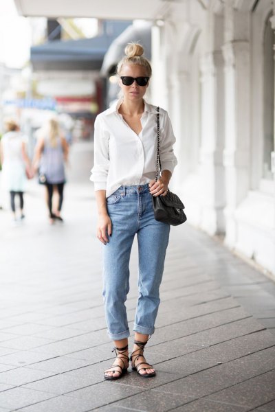 white button up shirt with light blue cuffed casual fit jeans