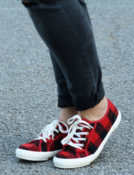 black cuffed jeans with red checkered lace of cloth shoes