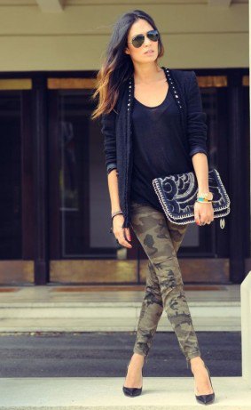 black shoe neck vest with blazer and cropped camo jeans