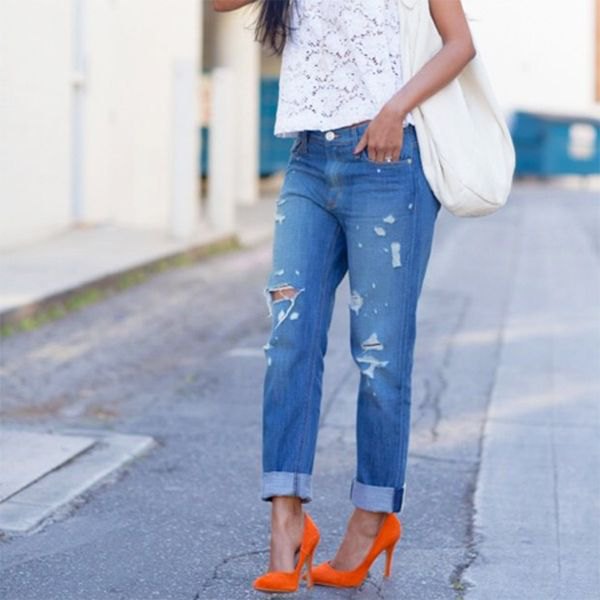white lace short sleeve top with blue cuffed boyfriend jeans