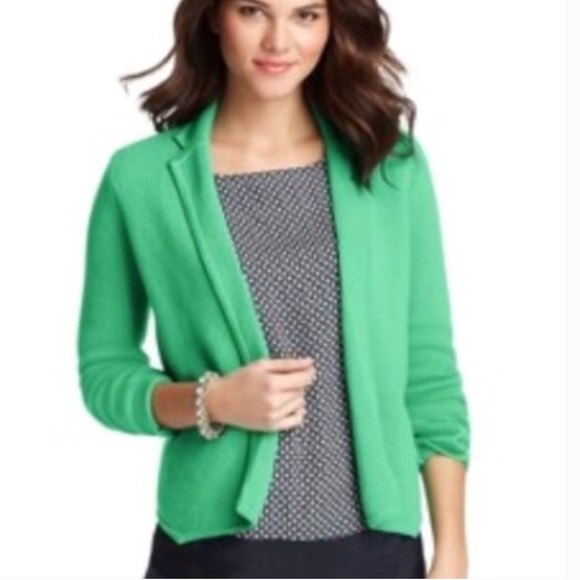 light green wool blazer with black and white printed blouse