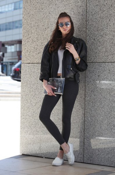black leather bomber jacket with cropped tee and white cloth shoes