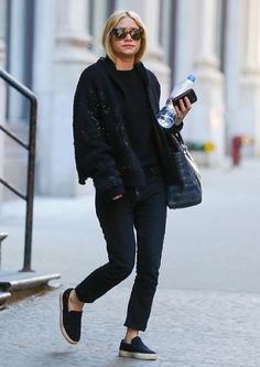 black bomber jacket with slim cut jeans and canvas slip on shoes