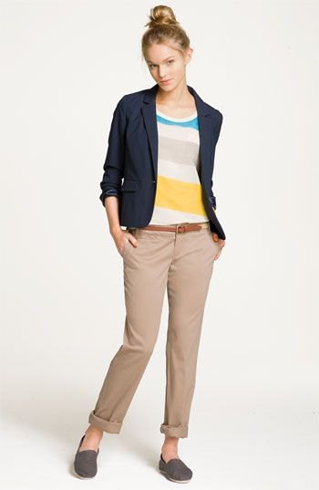 rainbow sweater with navy blue blazer and cropped trousers