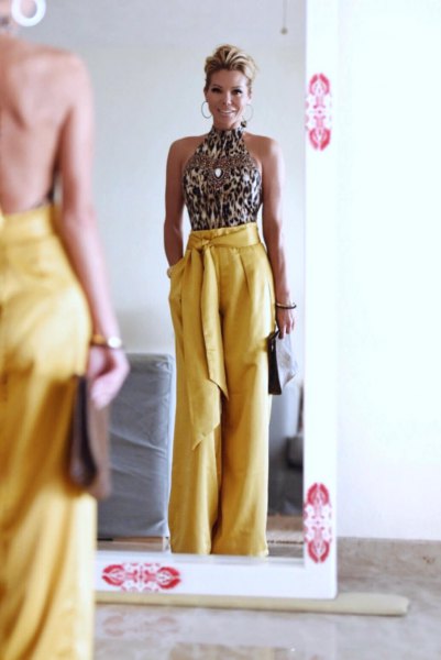 silver sequin gate with top with tie in waist yellow wide leg trousers