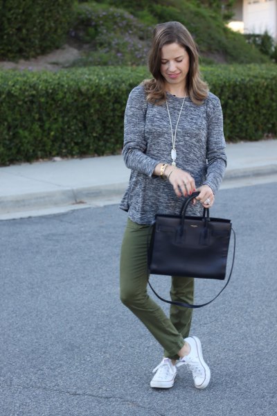 light gray casual fit sweater with green straight leg pants