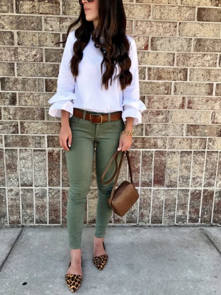 white ruffle sleeve blouse with skinny olive oil