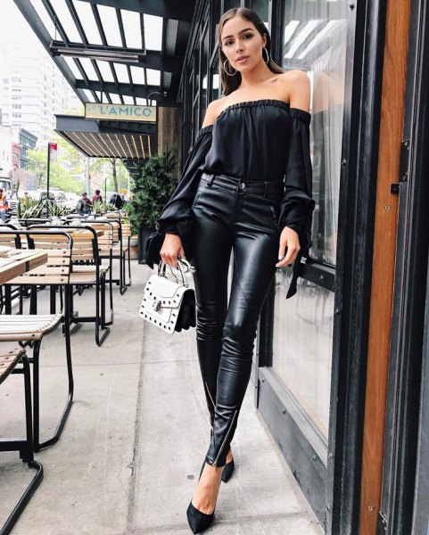 black of the shoulder blouse with high-heeled leather leggings