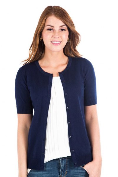 navy blue cardigan with white pleated blouse