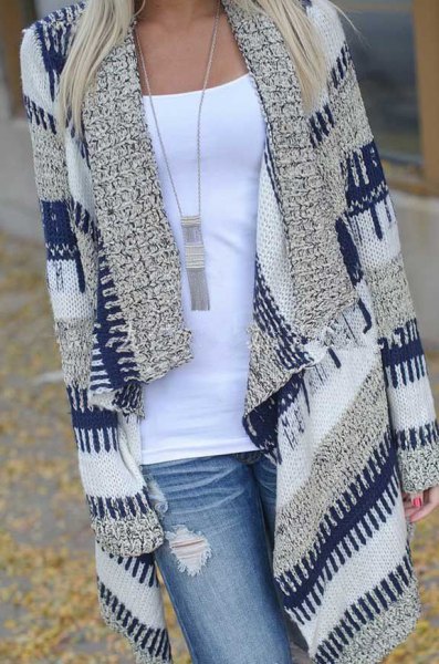 navy and gray striped longline sweater cardigan with light blue ripped jeans