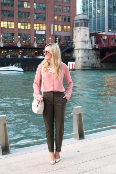 chiffon button shirt with statement necklace and gray chinos