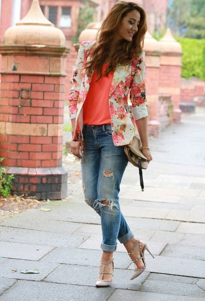 blush pink floral blazer with orange tank top and ripped jeans