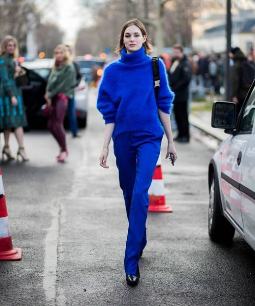 royal blue turtleneck chunky sweater with matching straight jeans