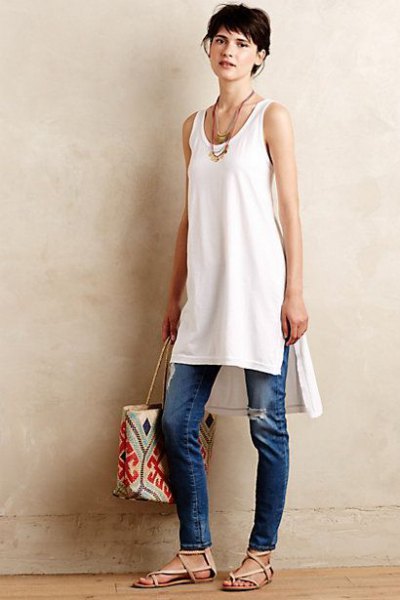 white tunic with blue thin jeans