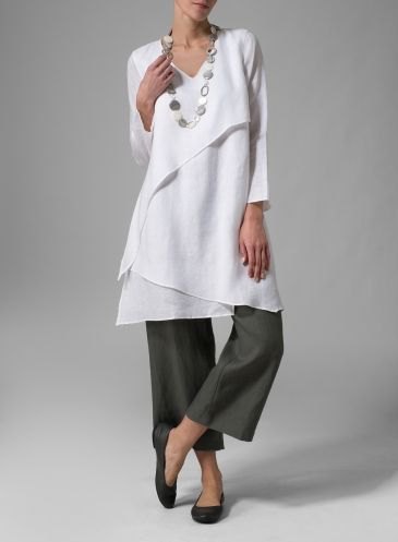 white multilayer tunic with gray trousers top