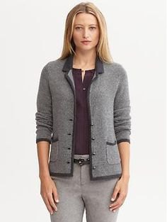 gray knitted blazer with black top and skinny pants in cotton