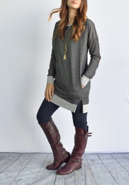 gray blue tunic top with dark skinny jeans and knee-high boots in leather