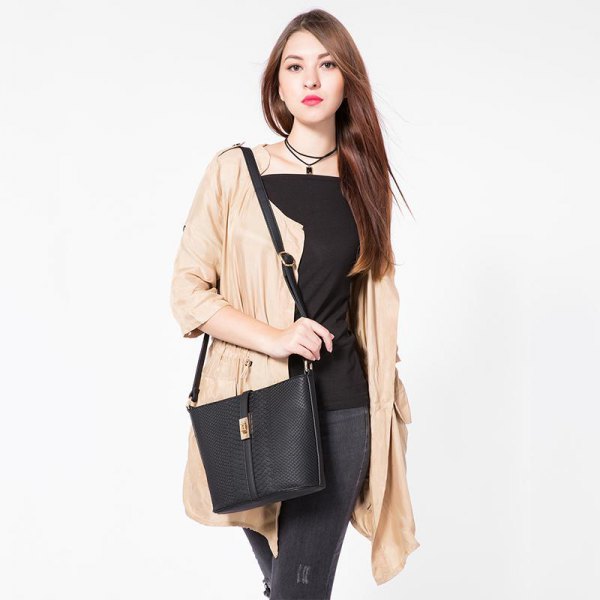 black square neckline with red cardigan and leather messenger bag