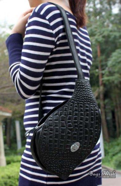 navy blue and white striped long sleeve tee with black loop leather bag