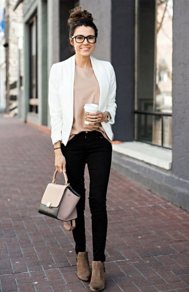 white casual blazer with pink top and black skinny jeans