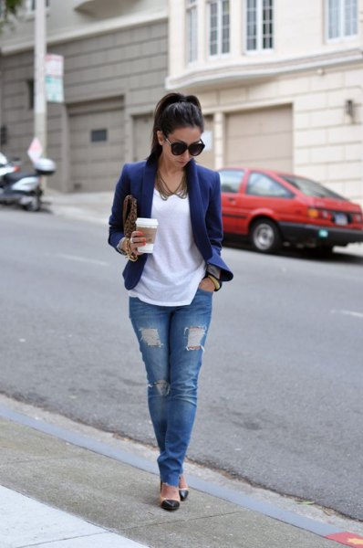 navy blazer jacket with white tee and ripped jeans