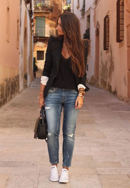 black blazer with deep v-neck sweater and cropped jeans
