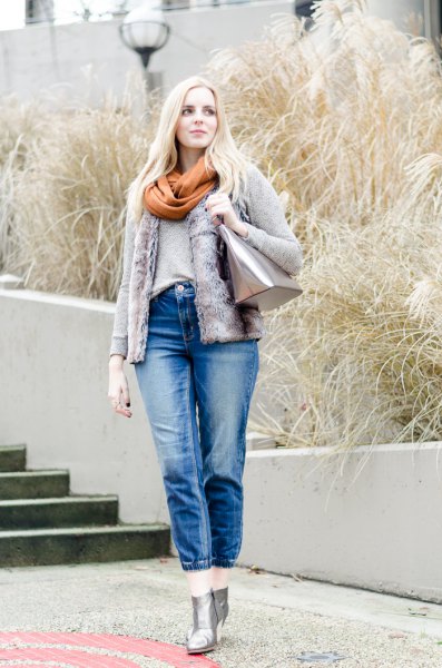 denim jacket with green scarf and cropped blue jeans