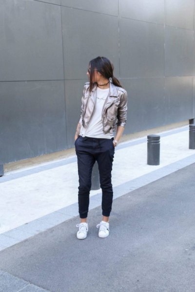 silver blazer with black cropped jogging jeans and white sneakers
