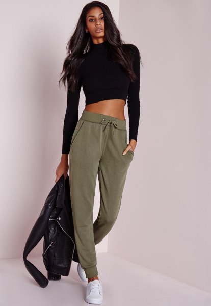 black cropped sweater with mock neck with green khaki jogs