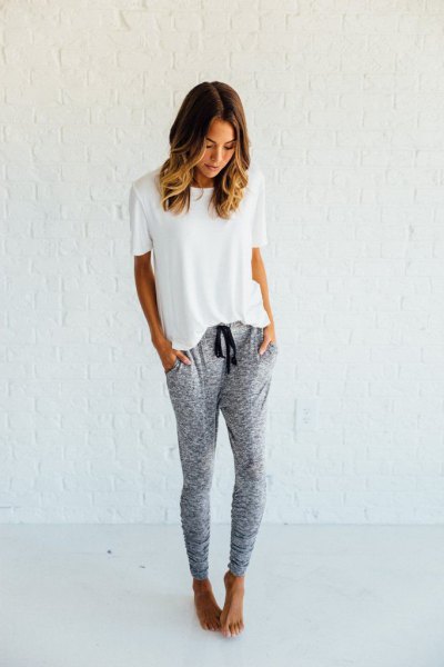 white t-shirt with gray joggers