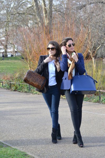 blue blazer with white blouse and navy purse