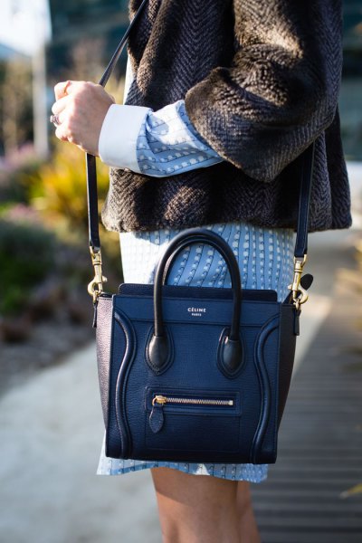 dark navy leather handbag with tweed jacket and blue dress