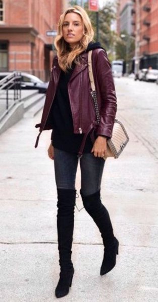 burgundy jacket with black sweater and high thigh boots