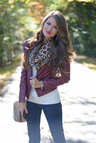 leather jacket with scarf with scarf and slim jeans
