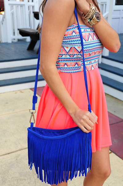 tribal printed pink mini pleated dress with royal blue fringe bag