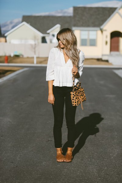 white v-neck half sleeve peplum blouse with black skinny jeans