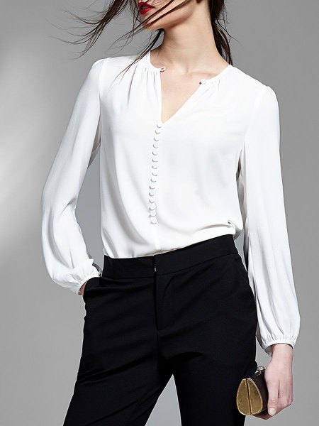white v-neck blouse with black high skinny jeans