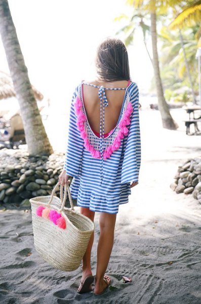 blue and white low back mini shirt dress with straw bag