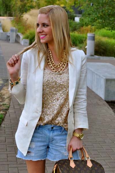 pink gold metallic blouse with white blazer and light blue denim shorts