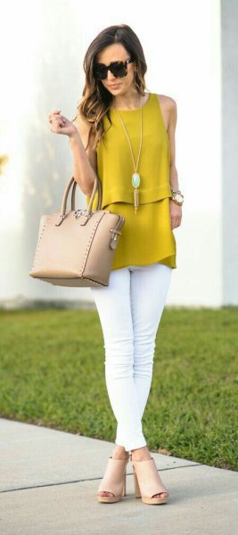 sleeveless top with mustard with white skinny jeans and red open toe boots