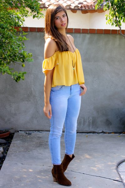 from a yellow top with sky blue jeans