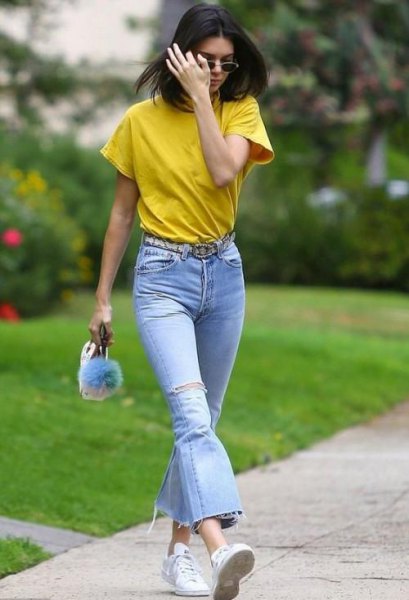 mustard t-shirt with light blue flared jeans