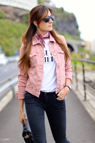 pink denim jacket with white print tee and light blue silk choker scarf