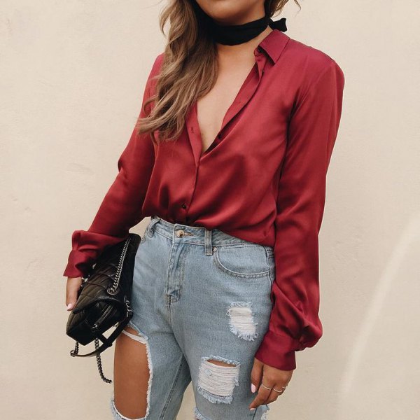 red satin shirt with black choker and ripped jeans