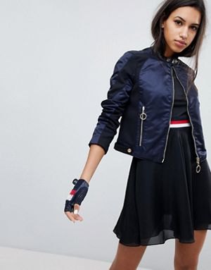 Black cotton nylon jacket with crop top and mini skater chiffon skirt