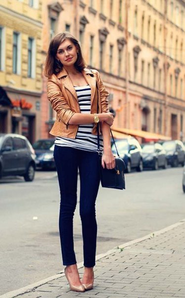 tank leather jacket with black and white striped tee and dark skinny jeans