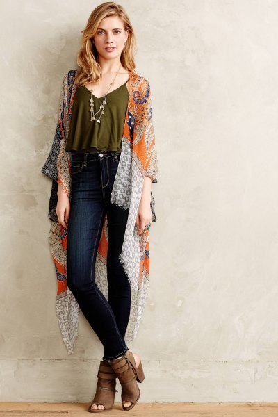 green cropped spaghetti strap top with silk robe and dark jeans