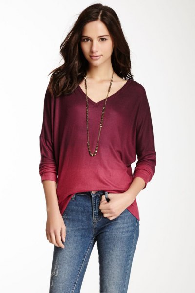 red and black tie color long sleeve v-neck t-shirt with skinny jeans