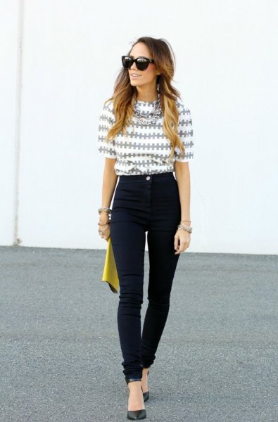 gray and white printed half-heated blouse with black high waist jeans
